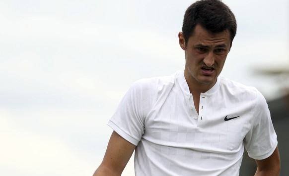 Australia&#039;s Bernard Tomic looks on during his Men&#039;s Singles Match against Germany&#039;s Mischa Zverev on day two at the Wimbledon Tennis Championships in London Tuesday, July 4, 2017. (AP P ...