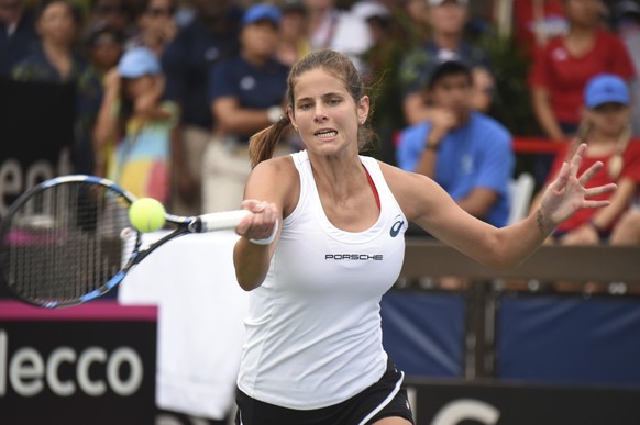 Germany&#039;s Julia Goerges hits a first-set return to United States&#039; Coco Vandeweghe before their match was suspended by rain, in a Fed Cup tennis quarterfinal in Lahaina, Hawaii, Saturday, Feb ...