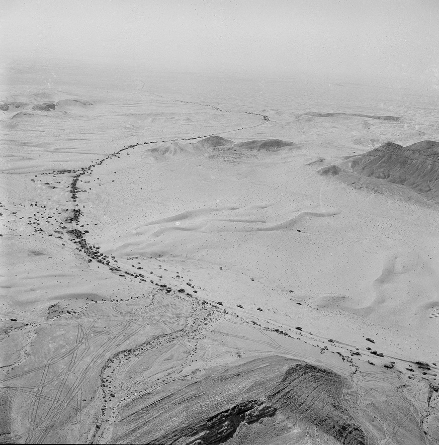An aerial view of the Mitla Pass, a strategic gateway to the Suez in the west central Sinai Peninsula, is littered with Egyptian equipment after being defeated by Israel, seen June 10, 1967. According ...
