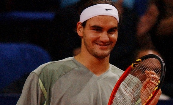 Swiss Roger Federer celebrates after winning the game against Andy Roddick from USA, at the Davidoff Swiss Indoors in Basel, Switzerland, Saturday, October 26, 2002. (KEYSTONE/Dominik Pluess)