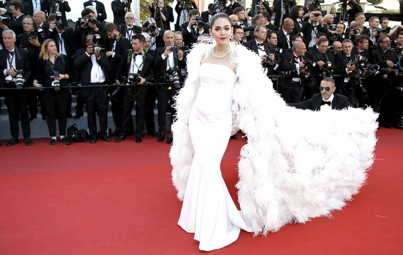 epa05970612 Thai actress Chompoo Araya arrive for the screening of &#039;Ismael&#039;s Ghosts&#039; and the Opening Ceremony of the 70th annual Cannes Film Festival in Cannes, France, 17 May 2017. Pre ...