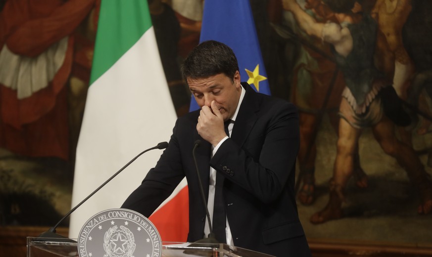 Italian Premier Matteo Renzi speaks during a press conference at the premier&#039;s office Chigi Palace in Rome, early Monday, Dec. 5, 2016. Renzi acknowledged defeat in a constitutional referendum an ...