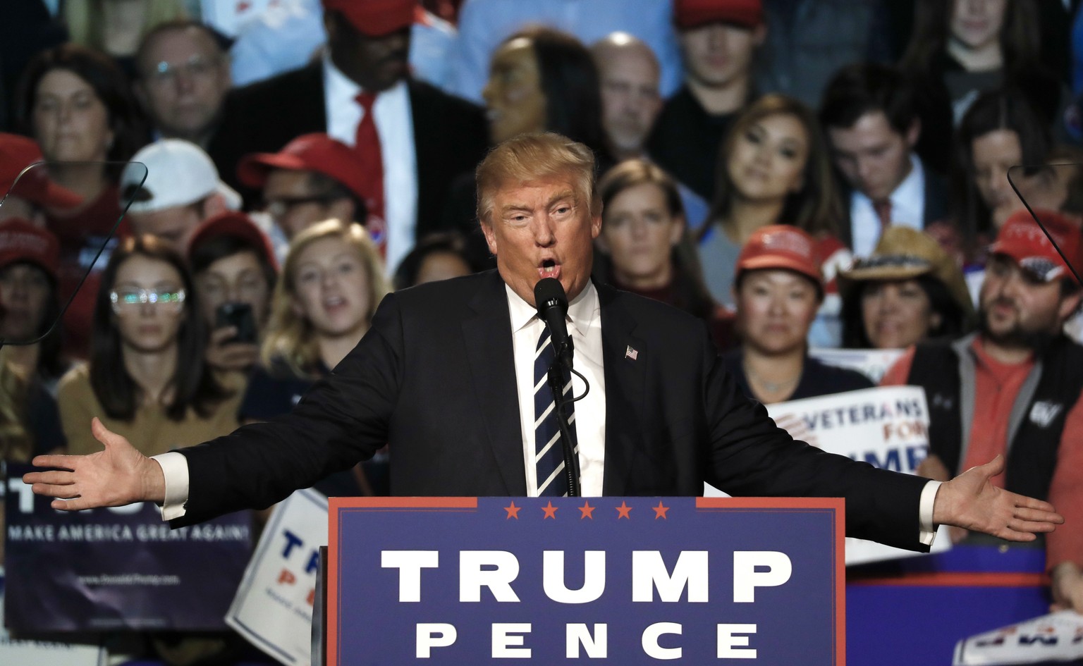 FILE - In this Tuesday, Nov. 8, 2016 file photo, Republican presidential candidate Donald Trump speaks at a campaign rally in Grand Rapids, Mich. If there was any doubt about whether Donald Trump mean ...