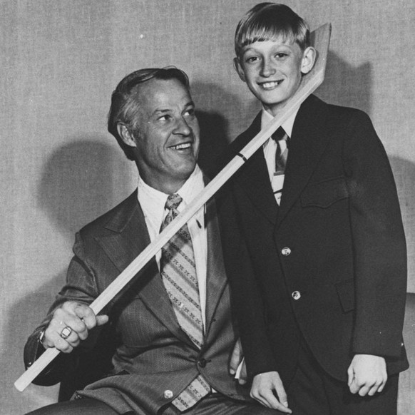 FILE--Eleven-year-old Wayne Gretzky, right, meets hockey great Gordie Howe at the Great Men of Sports dinner held by the Kiwanis Club in Brantford, Ontario, May 4, 1972. Gretzky announced his retirmen ...