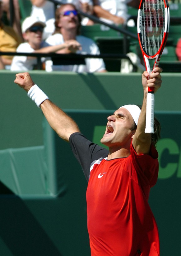 Roger Federer of Switzerland celebrates a point during his match against Andre Agassi of the USA during their semifinal match at the Nasdaq-100 Open in Key Biscayne, Florida Friday 01 April 2005. Fede ...