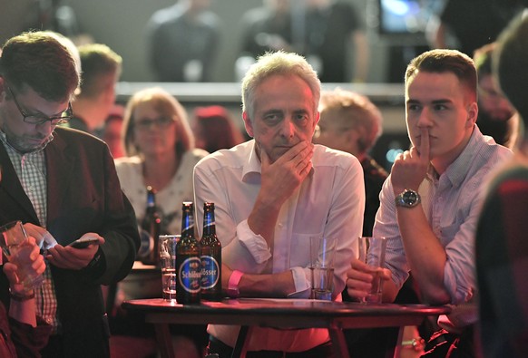 Supporters of the Social Democratic party wait for the first results to be published just before the end of the state election in the western German state of Northrhine-Westphalia in Duesseldorf, Germ ...