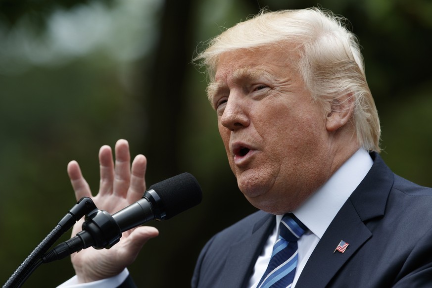 FILE - In this May 4, 2017 file photo, President Donald Trump speaks in the Rose Garden of the White House in Washington. A luxury Caribbean property Trump purchased four years ago is for sale, raisin ...