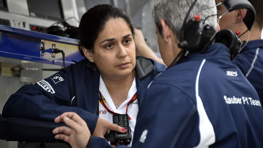 epa05575823 Sauber team principal Monisha Kaltenborn (L) listens to a team member at the end of the qualifying session for the Japanese Formula One Grand Prix at the Suzuka Circuit in Suzuka, central  ...