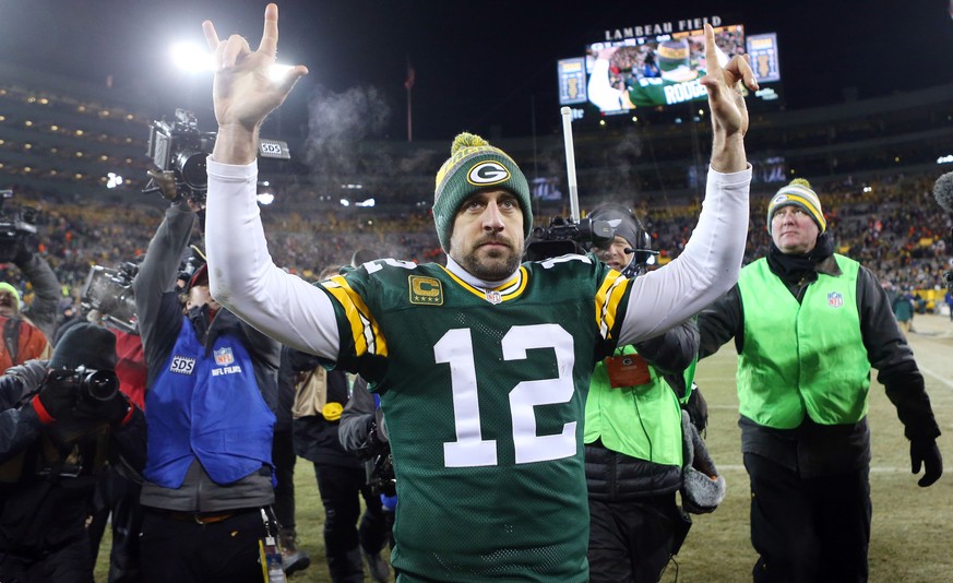 Jan 8, 2017; Green Bay, WI, USA; Green Bay Packers quarterback Aaron Rodgers (12) celebrates as he leaves the field after defeating the New York Giants in the NFC Wild Card playoff football game at La ...