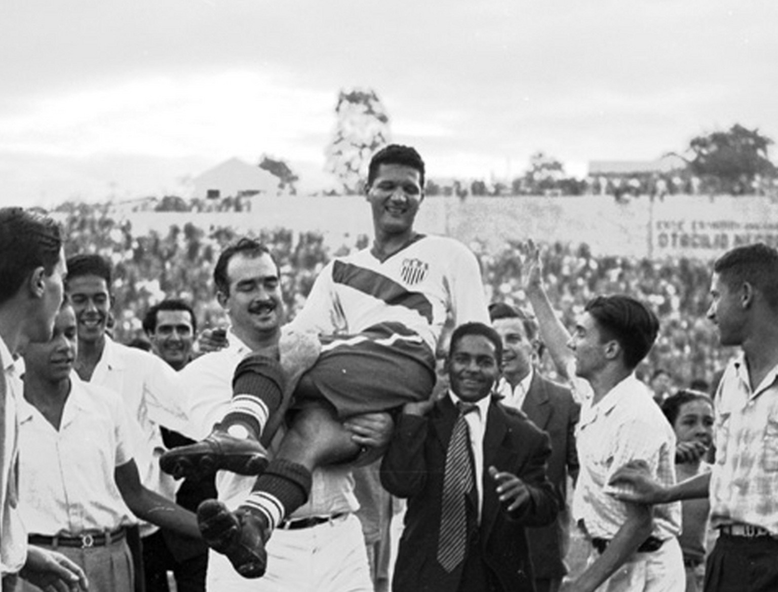 FILE - In this June 28, 1950 file photo, United States soccer player Joe Gaetjens is carried off by cheering fans after the USA team beat England 1-0 in a World Cup soccer match in Belo Horizonte, Bra ...