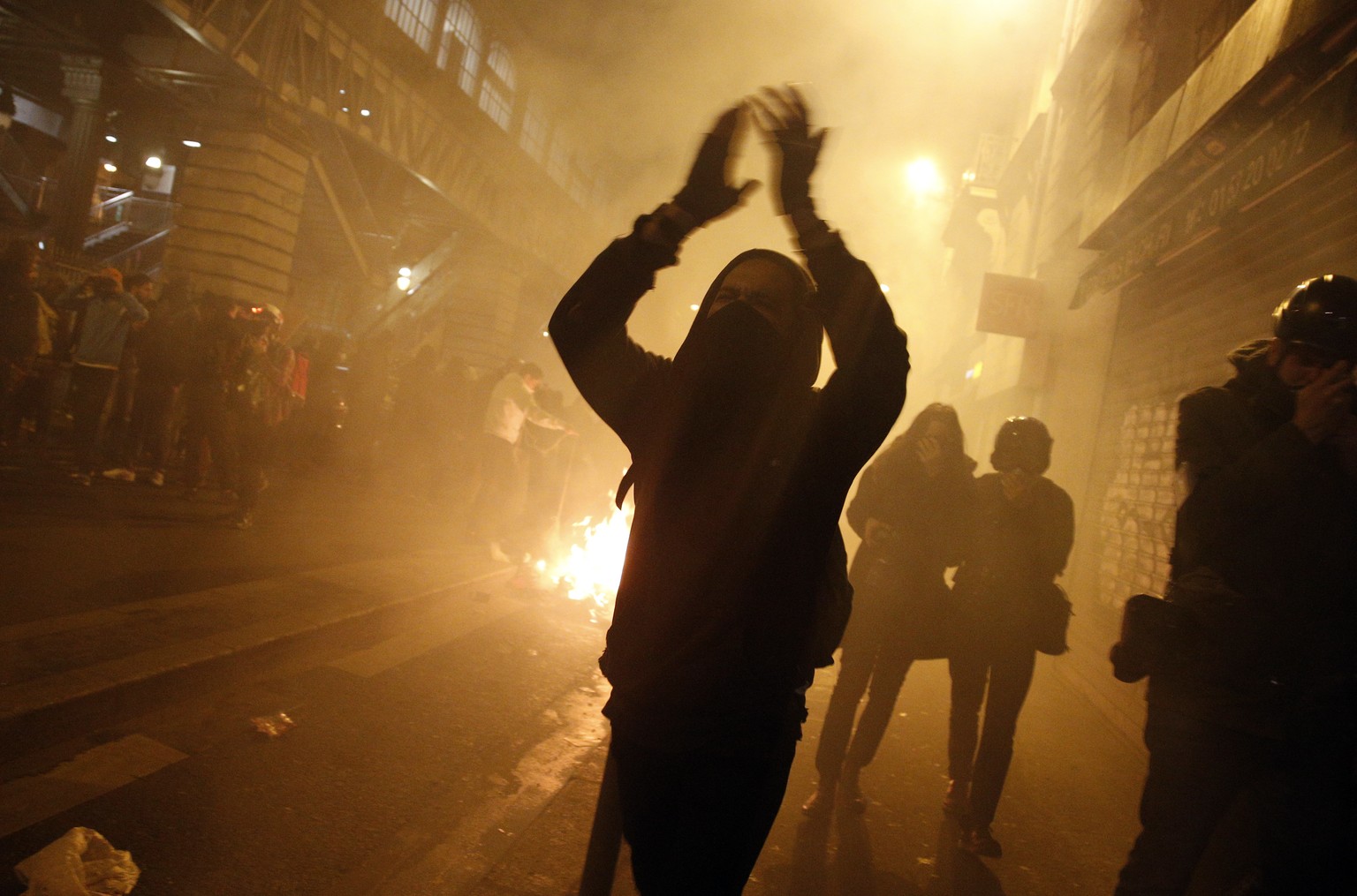 Demonstrators attend a protest against alleged police abuses, in Paris on Wednesday Feb. 15, 2017. French authorities have launched Tuesday a new investigation into alleged police abuse by an officer  ...