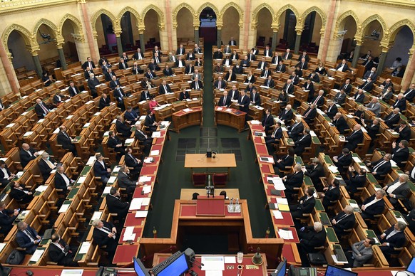 epa08315628 Hungarian Prime Minister Viktor Orban (C-R) delivers his speech about the current state of the coronavirus during a plenary session in the House of Parliament in Budapest, Hungary, 23 Marc ...