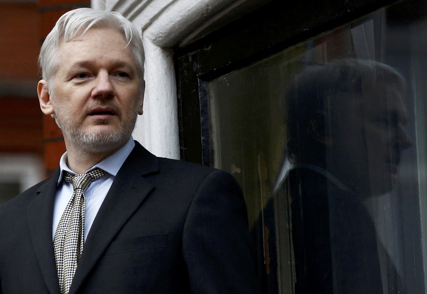 WikiLeaks founder Julian Assange makes a speech from the balcony of the Ecuadorian Embassy, in central London, Britain February 5, 2016. REUTERS/Peter Nicholls/Files