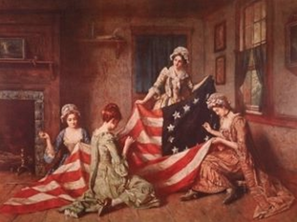 Frauen nähen die amerikanische Flagge.