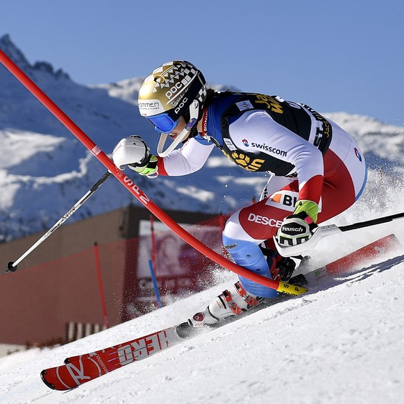 Michelle Gisin from Switzerland in action during the first run of the women&#039;s slalom race at the FIS Alpine Ski World Cup Finals, in St. Moritz, Switzerland, Saturday, March 19, 2016. (KEYSTONE/G ...