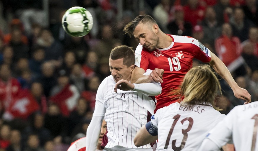 epaselect epa05870473 Swiss forward Josip Drmic (C) scores the opening goal during the 2018 Fifa World Cup Russia group B qualification soccer match between Switzerland and Latvia, at the stade de Gen ...