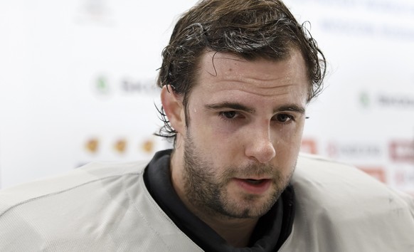 Switzerland&#039;s goaltender Sandro Zurkirchen speaks to the reports, after a training session of the IIHF 2016 World Championship at the practice arena of the Ice Palace, in Moscow, Russia, Monday,  ...