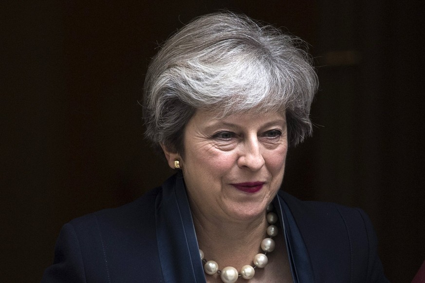 epa06187469 Britain&#039;s Prime Minister Theresa May leaves No. 10 Downing Street to attend Prime Ministers Questions (PMQS) at the House of Commons in London, Britain, 06 September 2017. Mays retur ...