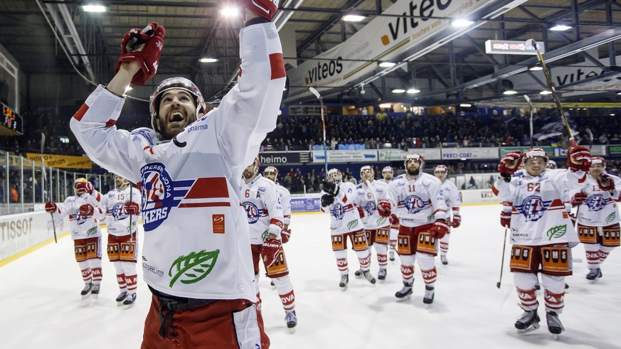 Lakers&#039; forward Antonio Rizzello (front) and his teammates celebrate their victory after beating La Chaux-de-Fonds, during the fifth leg of the Playoffs semifinal game of National League B (NLB)  ...