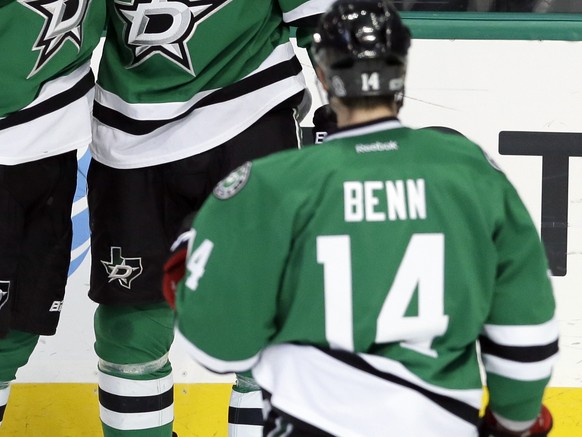 Dallas Stars&#039; Dan Hamhuis (2) and Jamie Benn (14) celebrate with Tyler Seguin (91) after his goal against the Minnesota Wild in the second period of an NHL hockey game in Dallas, Saturday Jan. 14 ...