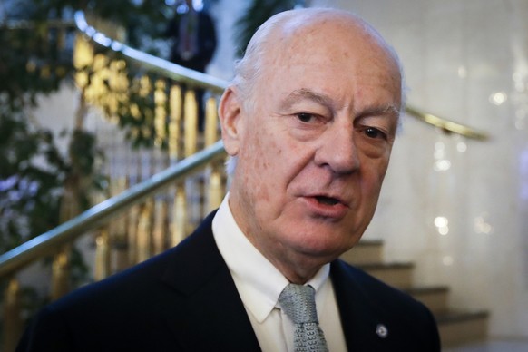 FILE -- In this Jan. 24, 2017 file photo, U.N. Special Envoy for Syria Staffan de Mistura speaks to journalists as he arrives to attend the talks on Syrian peace, in Astana, Kazakhstan. On Thursday, F ...