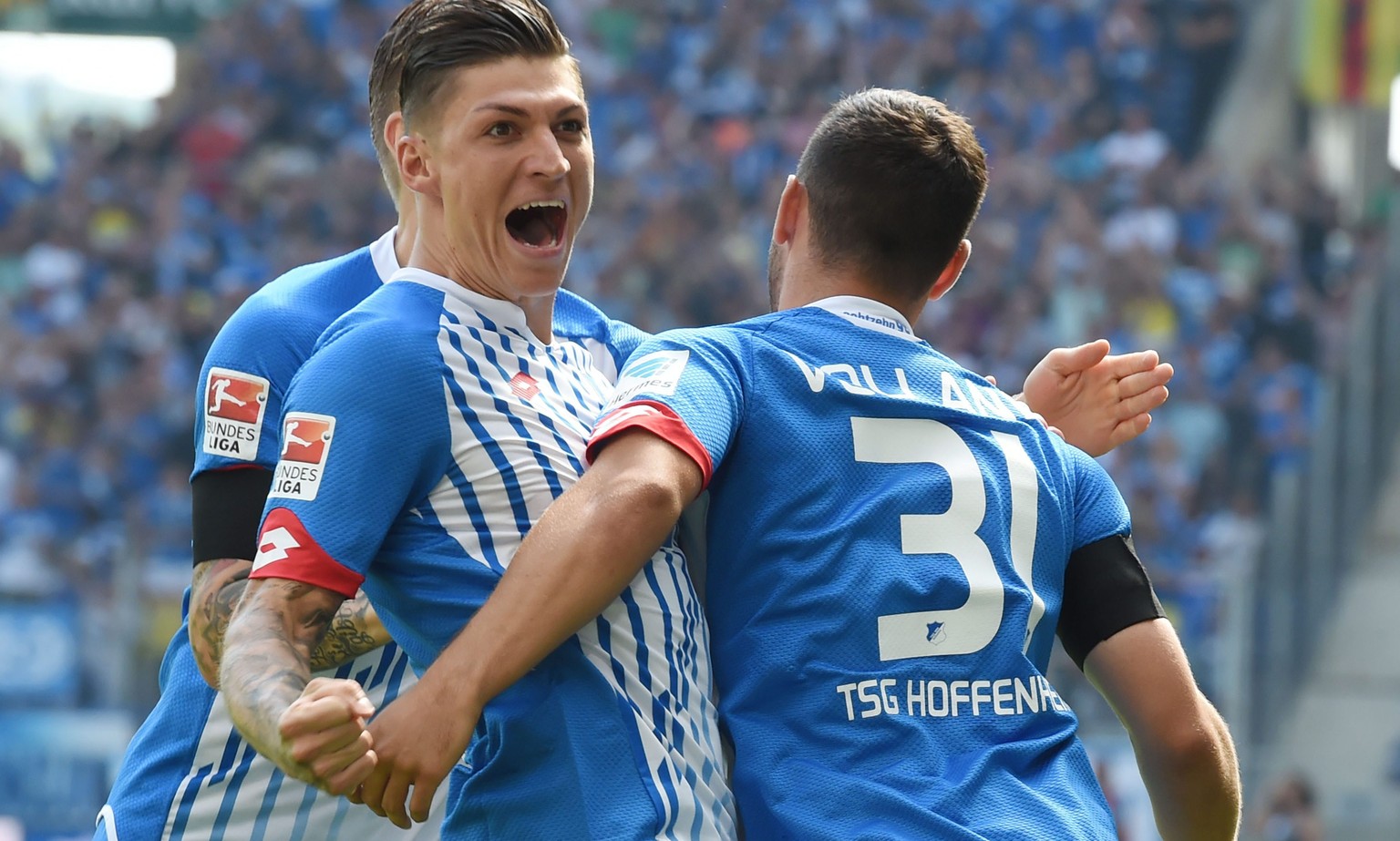 epa04892982 Hoffenheim&#039;s Steven Zuber (L) and Kevin Volland celebrate 1-0 goal by Volland during the German Bundesliga soccer match between TSG 1899 Hoffenheim and FC Bayern Munich at the Wirsol  ...