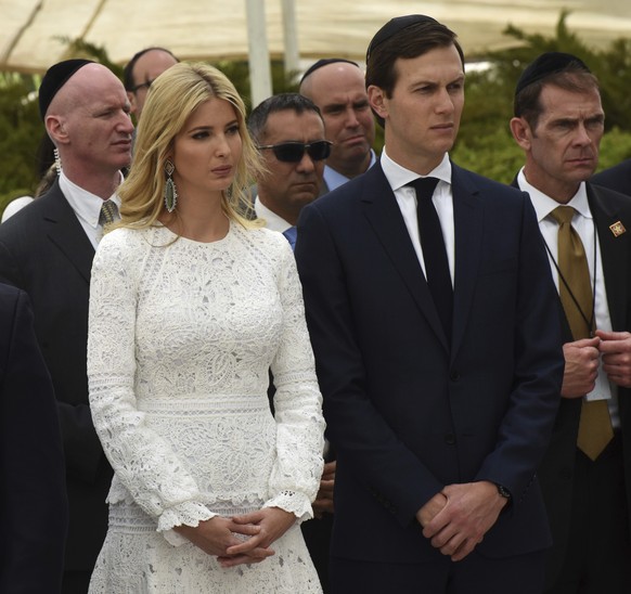 Ivanka Trump and her husband Jared Kushner listen to U.S. President Donald Trump at the Yad Vashem Holocaust Museum in Jerusalem, Israel, Tuesday, May 23, 2017. President Donald Trump on Tuesday pushe ...