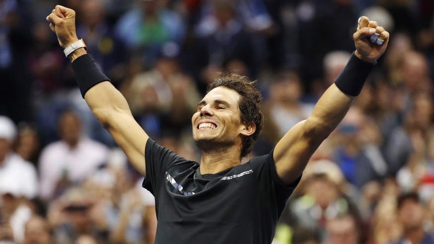 Rafael Nadal, of Spain, reacts after beating Kevin Anderson, of South Africa, to win the men&#039;s singles final of the U.S. Open tennis tournament, Sunday, Sept. 10, 2017, in New York. (AP Photo/Jul ...