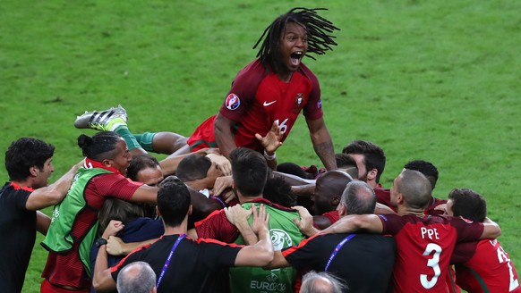 Portugal&#039;s Eder celebrates with team mates, after scoring the opening goal during the Euro 2016 final soccer match between Portugal and France at the Stade de France in Saint-Denis, north of Pari ...