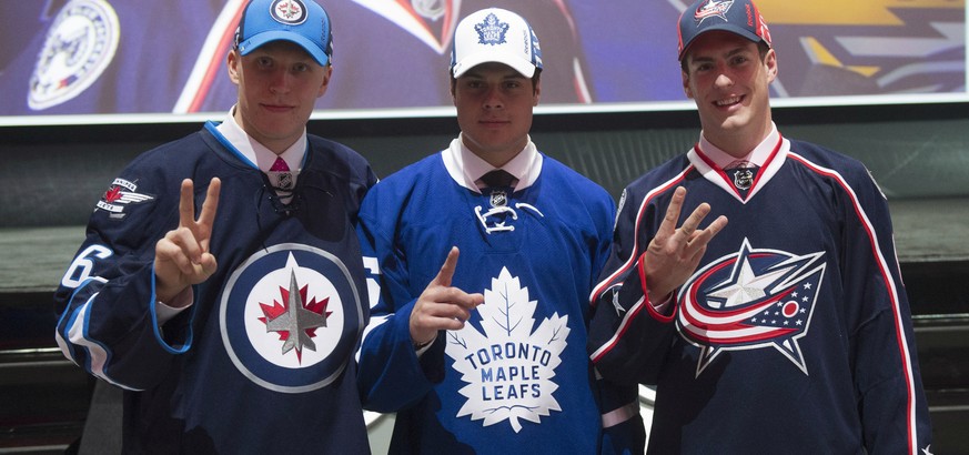 Die Top 3 Picks in der NHL (v. l.): Patrik Laine, Winnipeg Jets; Auston Matthews, Toronto Maple Leafs; und Pierre-Luc Dubois, Columbus Blue Jackets.