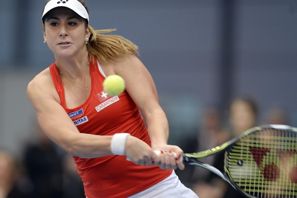 Switzerland&#039;s Belinda Bencic plays against Germany&#039;s Andrea Petkovic during their World Group first round of the Fed Cup tennis tournament in Leipzig, Germany, Saturday, February 6, 2015. (K ...