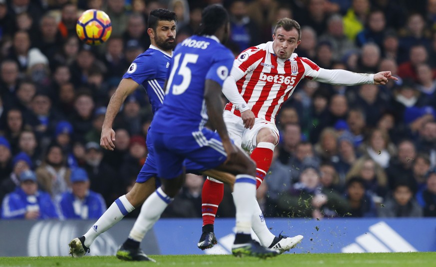 Britain Football Soccer - Chelsea v Stoke City - Premier League - Stamford Bridge - 31/12/16 Stoke City&#039;s Xherdan Shaqiri in action with Chelsea&#039;s Diego Costa Reuters / Eddie Keogh Livepic E ...