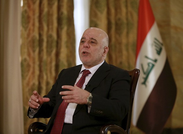 Iraq&#039;s Prime Minister Haider al-Abadi speaks during an interview with The Associated Press in Baghdad, Iraq, Saturday, Sept. 16, 2017. Iraq&#039;s Kurdish region plans to hold the referendum to g ...