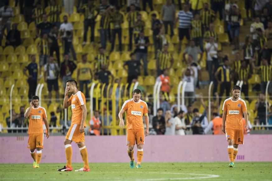 Players of GC react after Fenerbahce scored 3-0 during the UEFA Europa League playoff soccer match between Fenerbahce Istanbul (Turkey) and Grasshopper Club Zuerich (Switzerland) held at the Sukru Sar ...