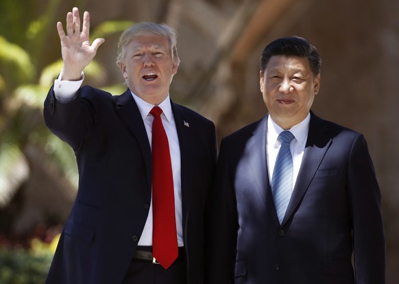 FILE - In this Friday, April 7, 2017, file photo, U.S. President Donald Trump, left, and Chinese President Xi Jinping pause for photographs at Mar-a-Lago in Palm Beach, Fla. North Korea often marks si ...