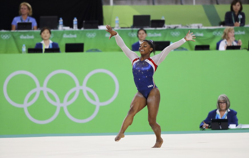 2016 Rio Olympics - Artistic Gymnastics - Final - Women&#039;s Individual All-Around Final - Rio Olympic Arena - Rio de Janeiro, Brazil - 11/08/2016. Simone Biles (USA) of USA competes on the floor du ...