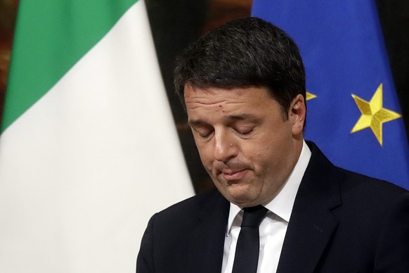 Italian Premier Matteo Renzi speaks during a press conference at the premier&#039;s office Chigi Palace in Rome, early Monday, Dec. 5, 2016. Renzi acknowledged defeat in a constitutional referendum an ...