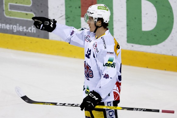 Biel&#039;s center Gaetan Haas celebrates his goal, after scored the 1:1, during the game of National League A (NLA) Swiss Championship between Geneve-Servette HC and HC Biel-Bienne, at the ice stadiu ...