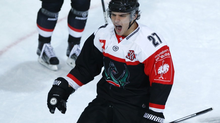 Fribourg&#039;s Yannick Rathgeb, celebrats his winning goal during the ice hockey Champions League match 1/8 Final between HC Fribourg-Gotteron and KalPa Kuopio of Finland, in Fribourg, Switzerland, T ...