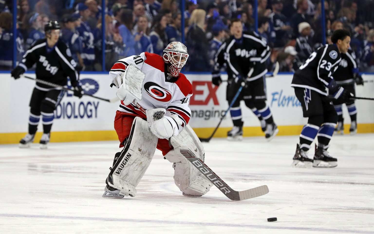 Carolina Hurricanes equipment manager Jorge Alves warms up after signing a contract to dress as an emergency backup for the team&#039;s NHL hockey game against the Tampa Bay Lightning on Saturday, Dec ...