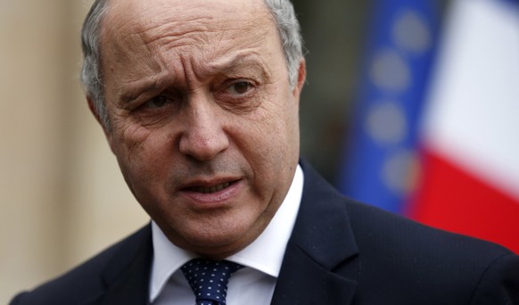 French Minister of Foreign Affairs Laurent Fabius leaves after the weekly cabinet meeting at the Elysee Palace in Paris in this February 19, 2014 file photo. Fabius, who has stood out in an otherwise  ...