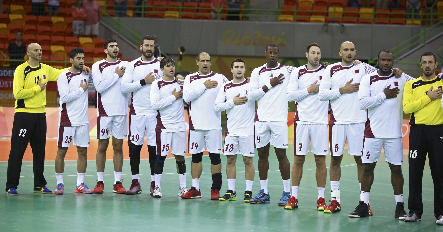 2016 Rio Olympics - Handball - Preliminary - Men&#039;s Preliminary Group A Qatar v France - Future Arena - Rio de Janeiro, Brazil - 09/08/2016. Qatar&#039;s players sing the national anthem before th ...