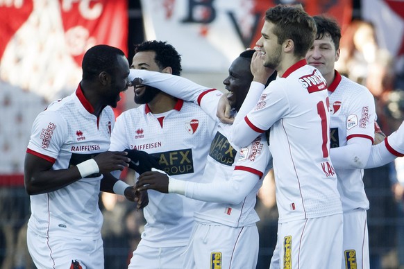 Sion&#039;s forward Chadrac Akolo, center, celebrates his goal past his teammates forward Moussa Konate, left, midfielder Carlitos, 2nd left, midfielder Gregory Karlen, 2nd right, and midfielder Verol ...