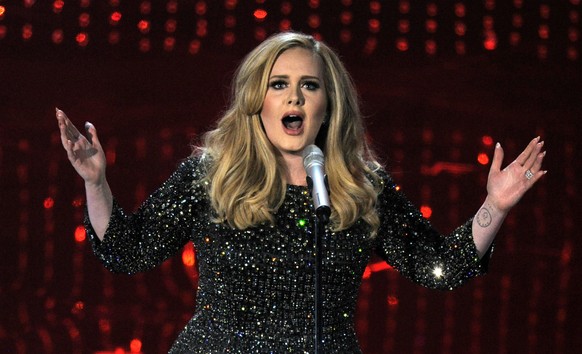 Sängerin Adele während eines Konzertauftritts 2013. Die Britin ist offiziell die meistgekaufte Musikerin der Welt.
