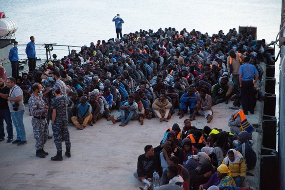 epa05992314 African migrants, who were rescued by the Libyan coastguard in the Mediterranean off the Libyan coast, arrive at a naval base in Tripoli, Libya, on 26 May 2017. The Libyan navy said. &#039 ...