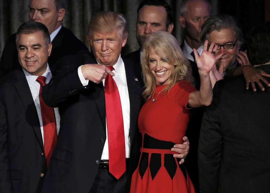 U.S. President-elect Donald Trump and his campaign manager Kellyanne Conway greet supporters during his election night rally in Manhattan, New York, U.S., November 9, 2016. REUTERS/Mike Segar