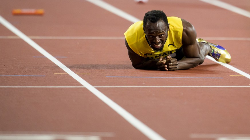 Usain Bolt from Jamaica reacts during the 4x100m Relay Men Final at the IAAF World Athletics Championships at the London Stadium, in the Queen Elizabeth Olympic Park in London, Britain, Saturday, Augu ...