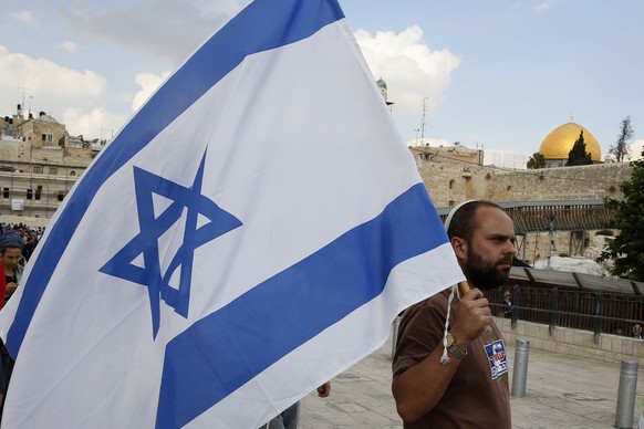 Right-wing Israelis demonstrate at the Western wall plaza next to al-Aqsa mosque compound, Islam&#039;s third holiest site, but also the most sacred spot for Jews who refer to it as the Temple Mount b ...