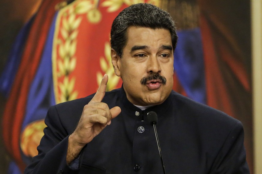 epa06156720 President of Venezuela, Nicolas Maduro, speaks at a press conference with international media at the Miraflores Palace in Caracas, Venezuela, 22 August 2017. Maduro commented on several is ...
