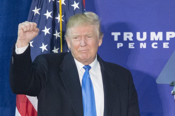 epa05653519 (FILE) A file photo dated 07 November 2016 showing then Republican presidential candidate, now president- elect Donald Trump campaigning at a rally at Loudon Fairgrounds in Leesburg, Virgi ...